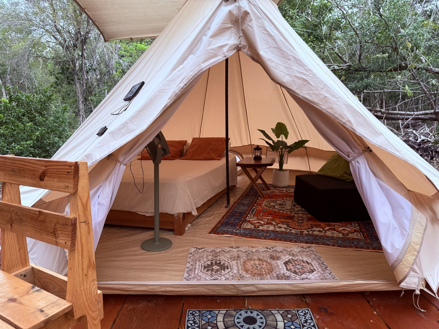 Looking into the Aluxes glamping tent from the deck.